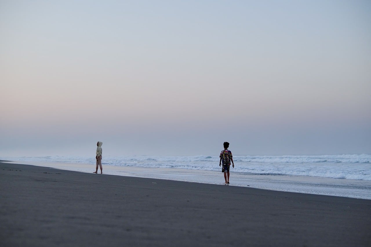 dark volcanic sand beach in the Azores