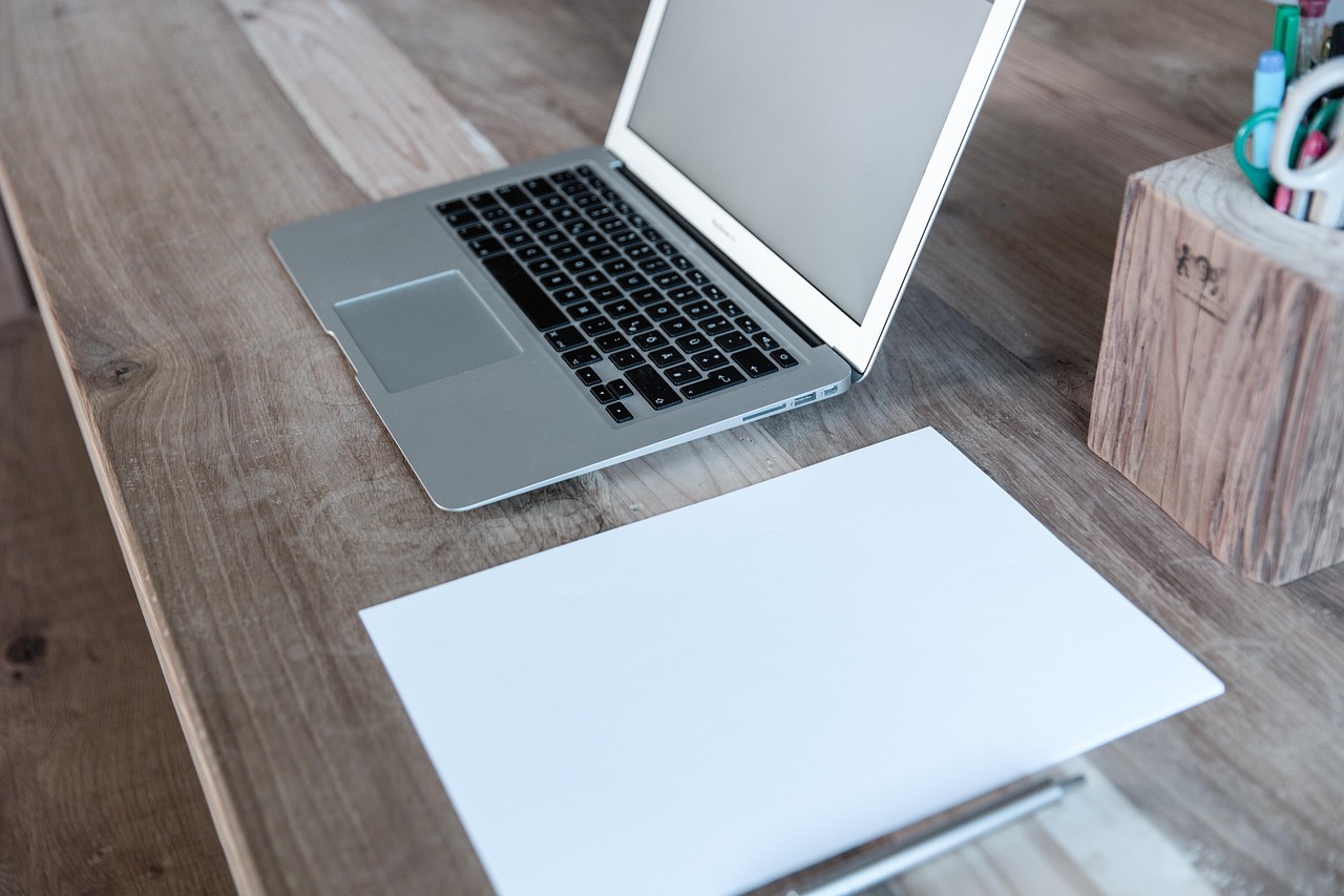Best Europe travel agents showcased on a modern office desk with laptop
