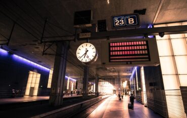 Europe travel essentials checklist with suitcase and passport