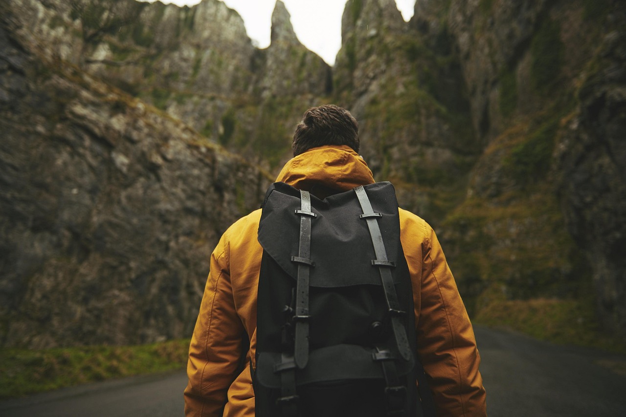 Hiker preparing gear for the Sa Pedrera de Cala d'Hort hike