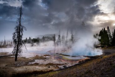 Steam rising from saturnia hot springs tuscany italy at dawn