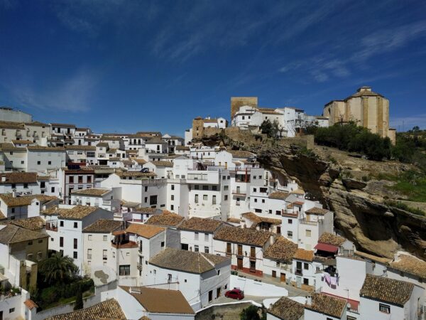 Stone arches over cave dwellings in setenil de las bodegas in spain