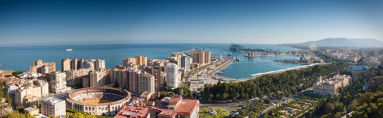 Malaga harbor with fishing boats and Mediterranean sea