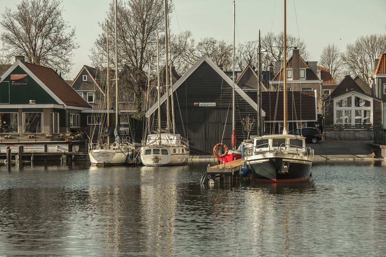 Colorful fishing boats resting in the calm waters of the main harbor in the city center