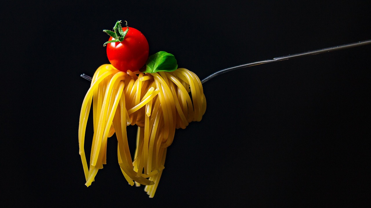 Fresh handmade pici pasta plates served in a traditional siena restaurant