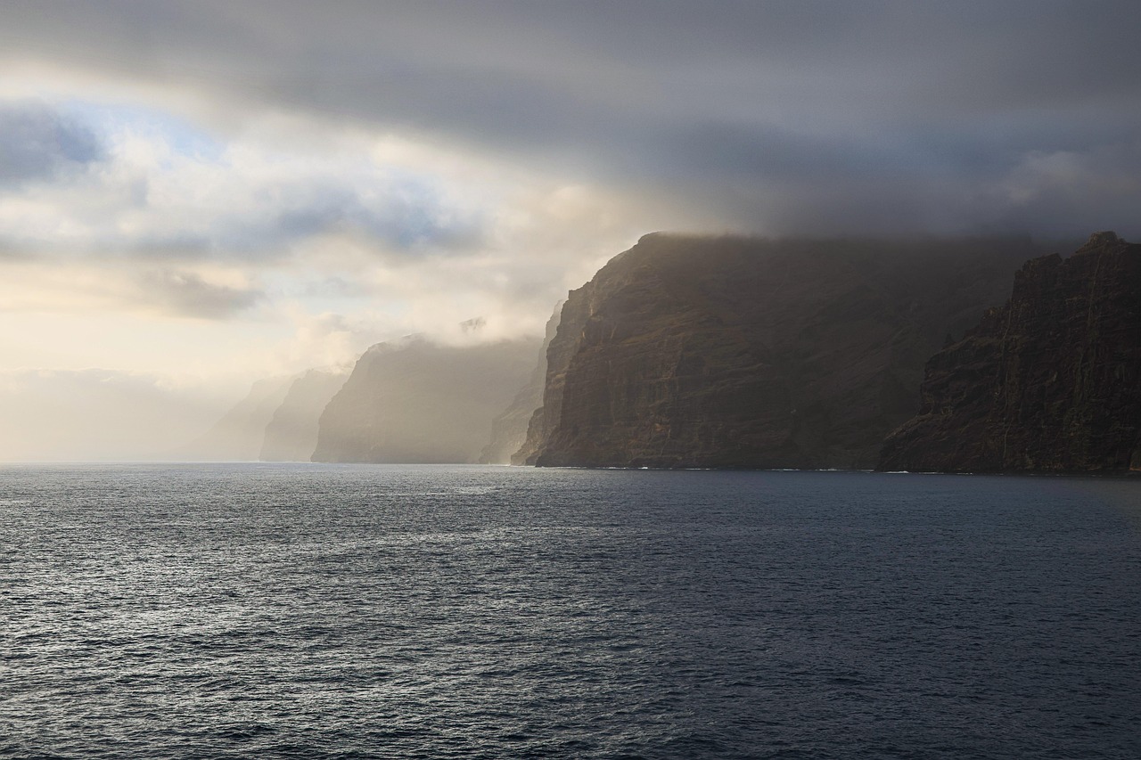 Towering basalt cliffs along the western coastline near Garachico