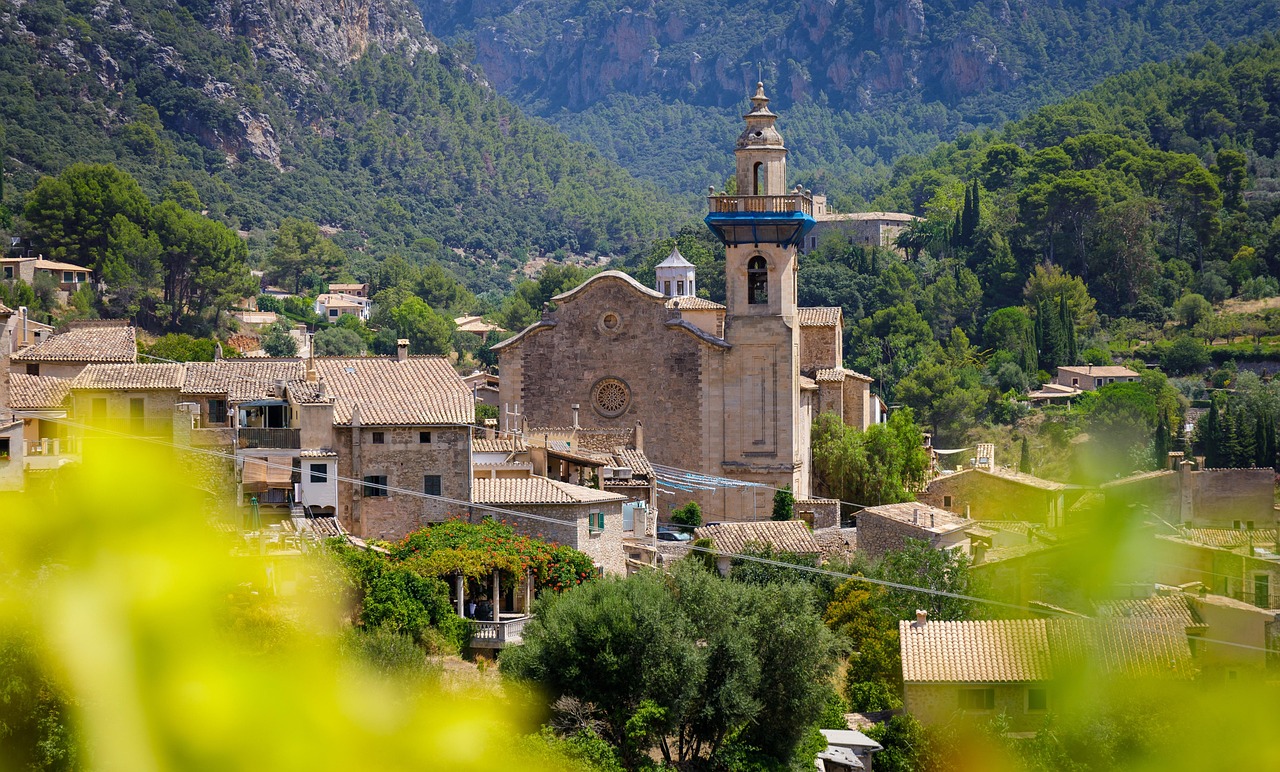 Traditional stone houses lining a quiet street in things to do in valldemossa area